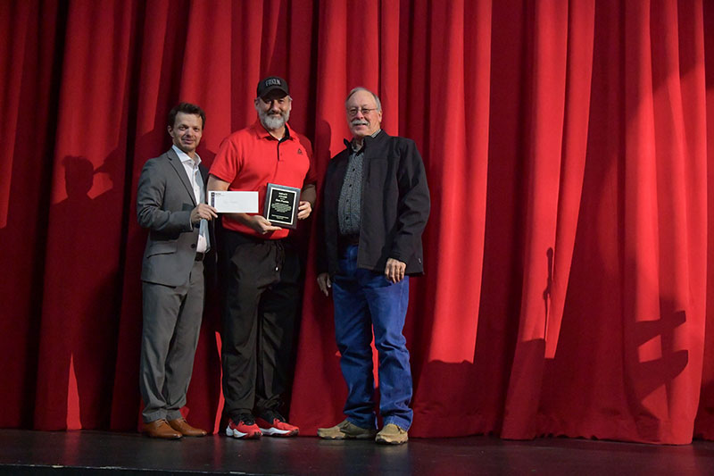 Faculty members receiving awards from the president