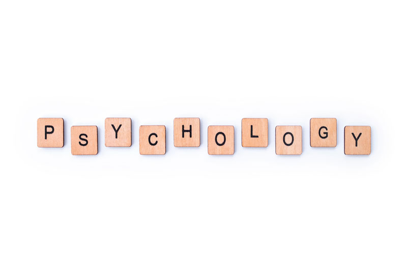 Wooden tiles that spell out the word psychology