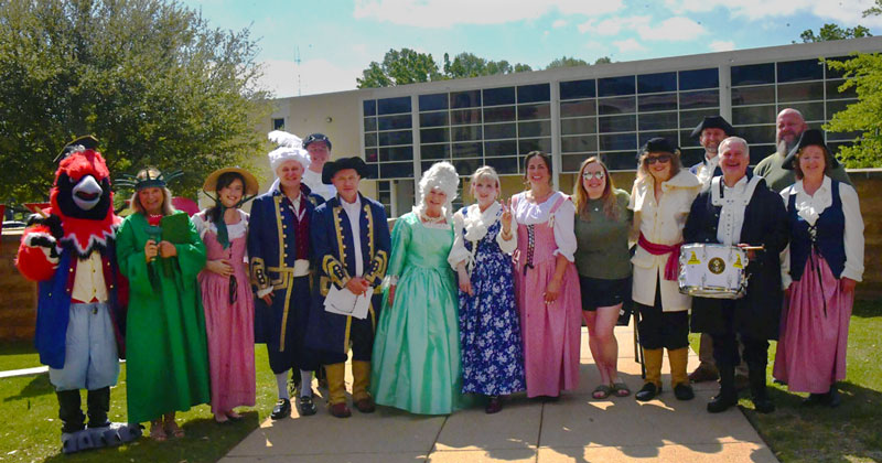 TVCC faculty and students lined up side for a group photo who are celebrating America's 250th birthday